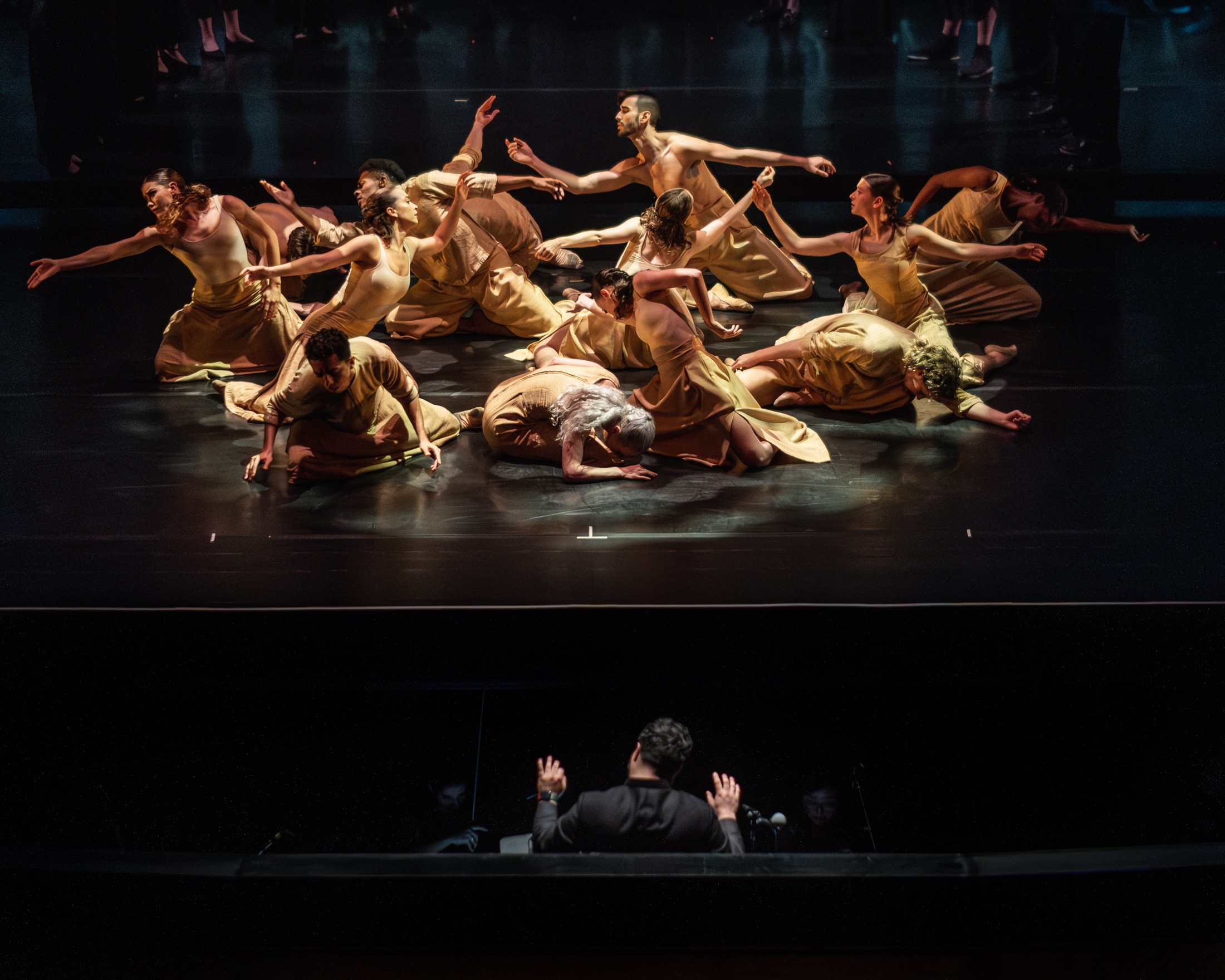 Sam conducting below dancers in SHAMS