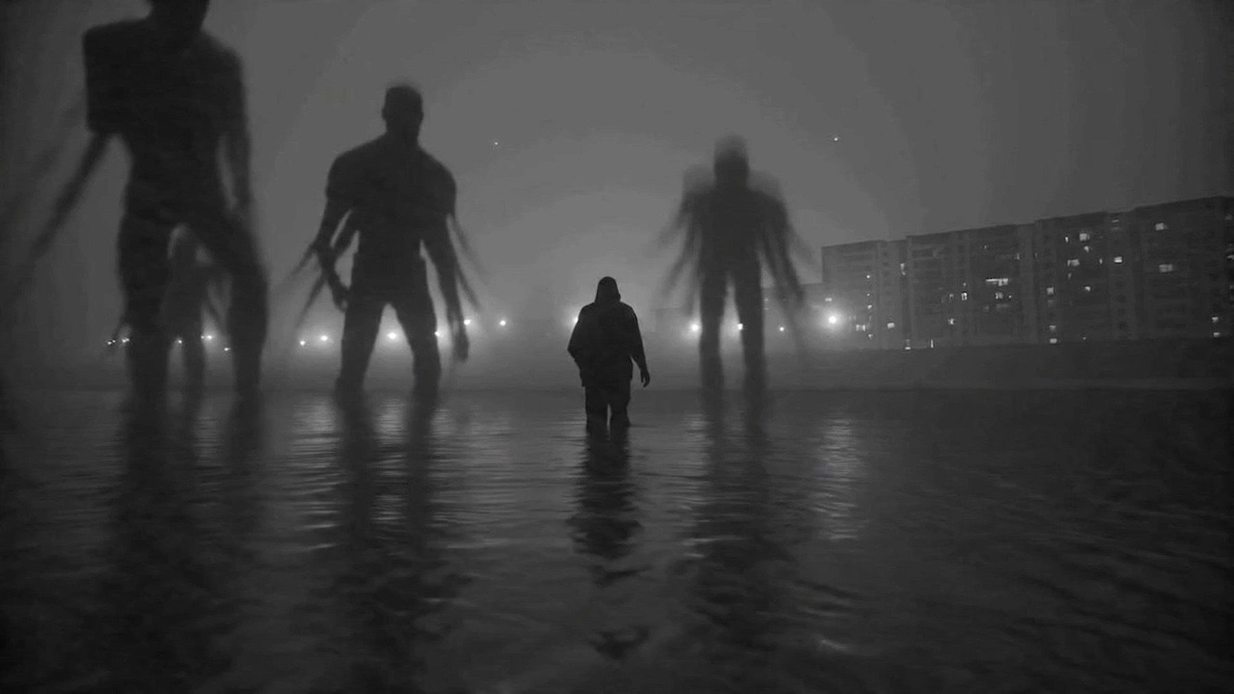 Black-and-white still from Gurbet showing giant figures in water